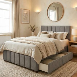 Detalle del conjunto en color gris, mostrando la apertura de los amplios cajones laterales diseñados para maximizar el orden en el dormitorio